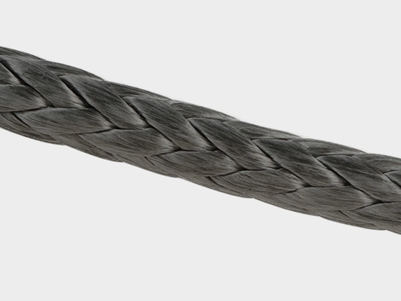 Close-up of black Technora® 12 strand rope for industrial use.