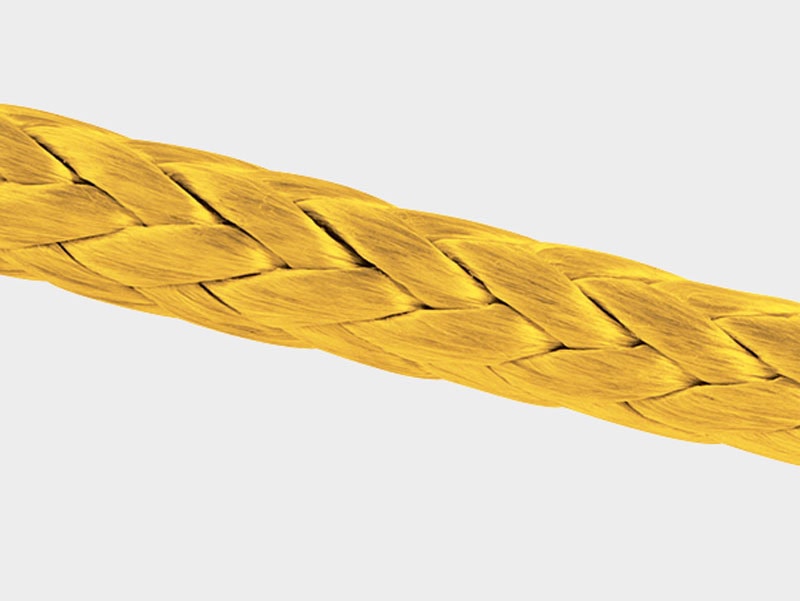 Close-up of yellow Technora® 12 strand rope for industrial use.